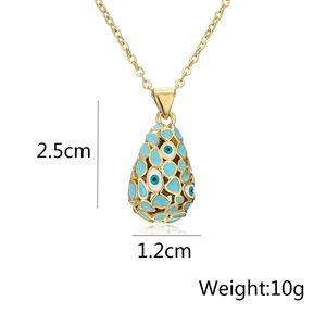 Detailed view of 18K gold-plated teardrop pendant with blue enamel eye pattern and dimensions