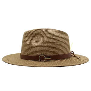 Classic light brown straw panama hat with brown leather belt and metal buckle on white background