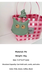 Detail of green cat-shaped PU leather coin purse with zipper and metal hook attachment