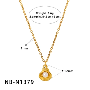 Detail view of gold shell and pearl pendant necklace with exact size specifications