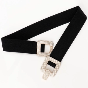 Elastic black waist belt featuring a square gold buckle set with shimmering rhinestones