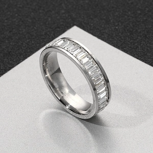 Eternity ring with baguette-cut sparkling crystals set in a silver-tone stainless steel band