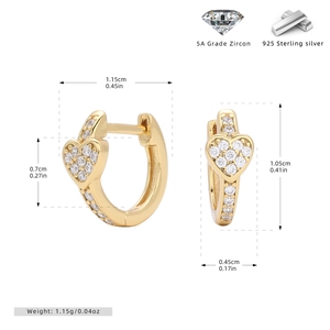 Detailed view of S925 sterling silver heart huggie earrings with cubic zirconia