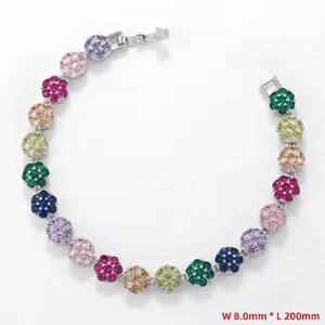 Detailed view of flower bracelet with colorful cubic zirconia and folding clasp detail