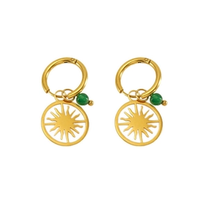 Detailed shot of hollow sun gold earrings featuring green bead accents on white background