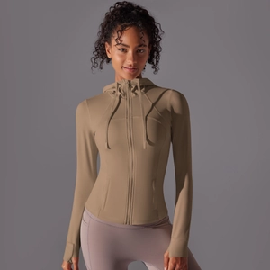 Detail of slim fit hooded sports jacket with front zipper and thumbhole cuffs design