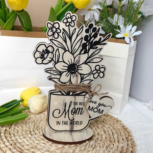 Detail of wooden Mother's Day plaque with The Best Mom In The World engraving and tulip decor