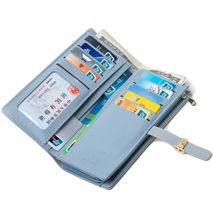 Women long wallet in light blue faux leather with multiple card slots and gold hardware