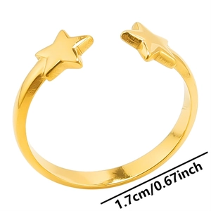 Close-up of golden star-shaped adjustable open ring with diameter measurement 1.7cm