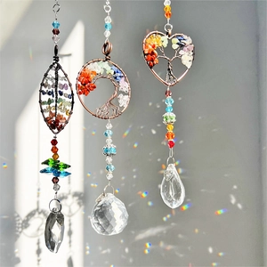 Three-piece Tree of Life crystal suncatchers with colorful stones and rainbow prisms