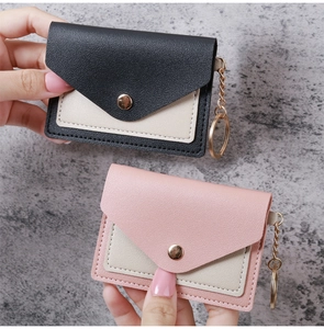 Mini envelope card holders in black and pink PU leather with golden keychains