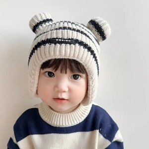 Cozy knit baby earflap hat in beige with black stripes and cute 3D ears on top