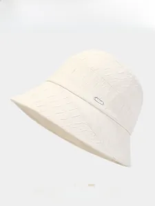 Detailed texture of women foldable bucket hat with metallic plate and 4 color options