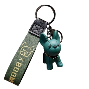 Cute dark green French Bulldog keychain with gold-studded collar and leather strap