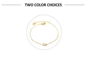 Detail view of gold stainless steel bracelet featuring rectangular zircon stone and S.Steel tag
