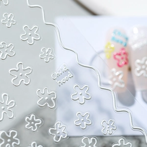 3D embossed white floral nail art stickers with Child hood lettering on clear backing