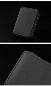 Detailed close-up of premium black lychee texture leather wallet with silver metal zipper