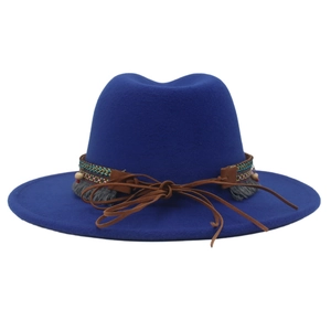 Detail of royal blue felt cowboy hat with bohemian embroidered band and colorful beads
