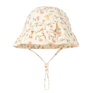 Close-up of baby cotton sun hat with floral print and adjustable decorative bow detail