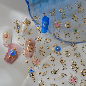 Exotic golden moon and star nail art stickers with mystical boho embossed metal designs