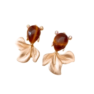Vintage goldfish stud earrings with brown cat-eye stones and crystal details