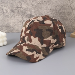 Close-up of vintage corduroy camouflage baseball cap with detailed fabric texture