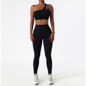 Women's black one-shoulder yoga set with sports bra and high-waisted leggings