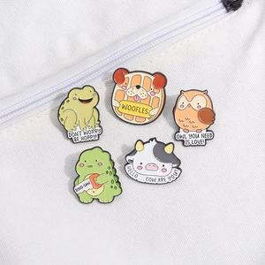 Set of five creative cartoon enamel pins featuring puns on a white canvas background