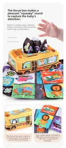 Detailed close-up of school bus tissue box toy with sensory crinkle fabrics for babies