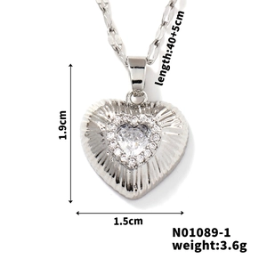 Detail view of heart pendant with 40+5cm chain length and 1.9cm zircon heart dimensions
