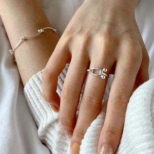 Minimalist 925 sterling silver jewelry set featuring U-shaped ring and beaded bracelet