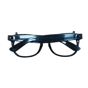 Detail shot of black plastic full-rim glasses for kids and adults on white background