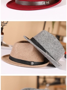 Detailed texture of wool felt fedora hats with leather belts and metal M buckle