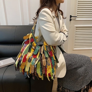 Bohemian snakeskin fringe shoulder bag with multi-color leather scales and tassels