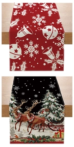 Detailed views of red snowflake and black reindeer sleigh patterns on festive table runners