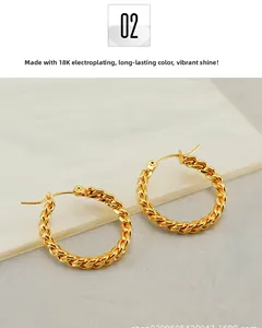 Detailed macro view of 18K gold-plated twisted hoop earrings with a shiny metallic texture