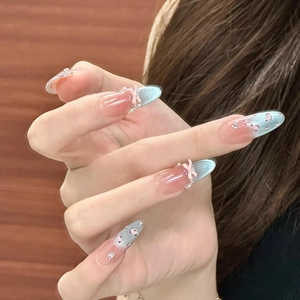 Pink and silver cat-eye gradient press-on nails with 3D bows and heart patterns