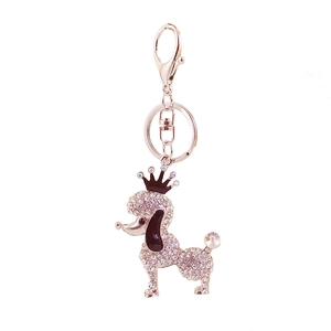 Sparkling rhinestone poodle keychain with black enamel crown on a polished metal ring