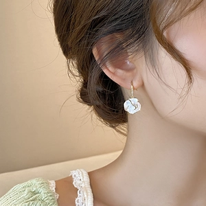Elegant white camellia flower drop earrings with gold metal edges and zircon accents