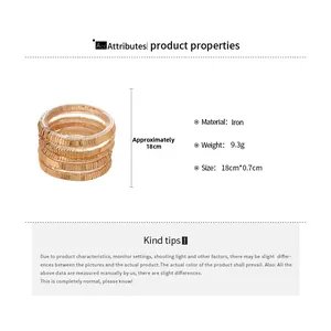 Detail of gold spiral iron bracelet showing 18cm length and 9.3g weight specifications
