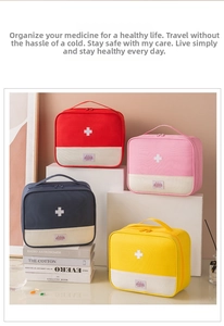 Detailed view of portable oxford cloth first aid kits in red, navy, pink, and yellow colors
