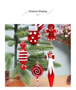 Close-up of red and white Christmas ornaments including gingerbread man and candy shapes