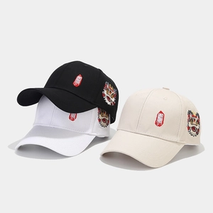 Detailed embroidery of Chinese lion head and characters on multi-color cotton baseball caps