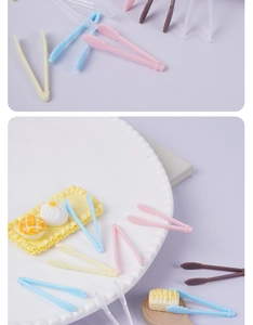 Detailed close-up of mini colorful plastic tweezers for DIY miniature food craft projects