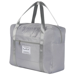 Large gray oxford fabric travel bag with reinforced handles and sturdy front zipper pocket