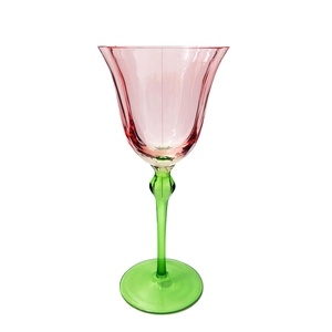 Elegant pink and green crystal wine glass with vintage floral design on white background