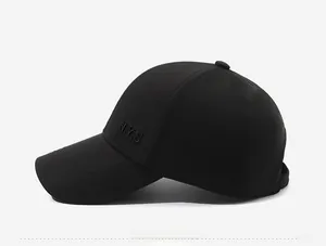 Detail of NYS 3D embroidery and reinforced stitching on a black sports baseball cap