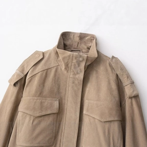Khaki faux suede jacket with military style shoulder tabs and symmetrical chest pockets