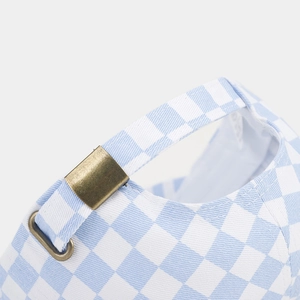 Detail of blue and white checkered baseball cap with adjustable antique bronze metal buckle