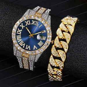 Close-up of hip hop gold watch with blue Roman dial and iced out Cuban bracelet set